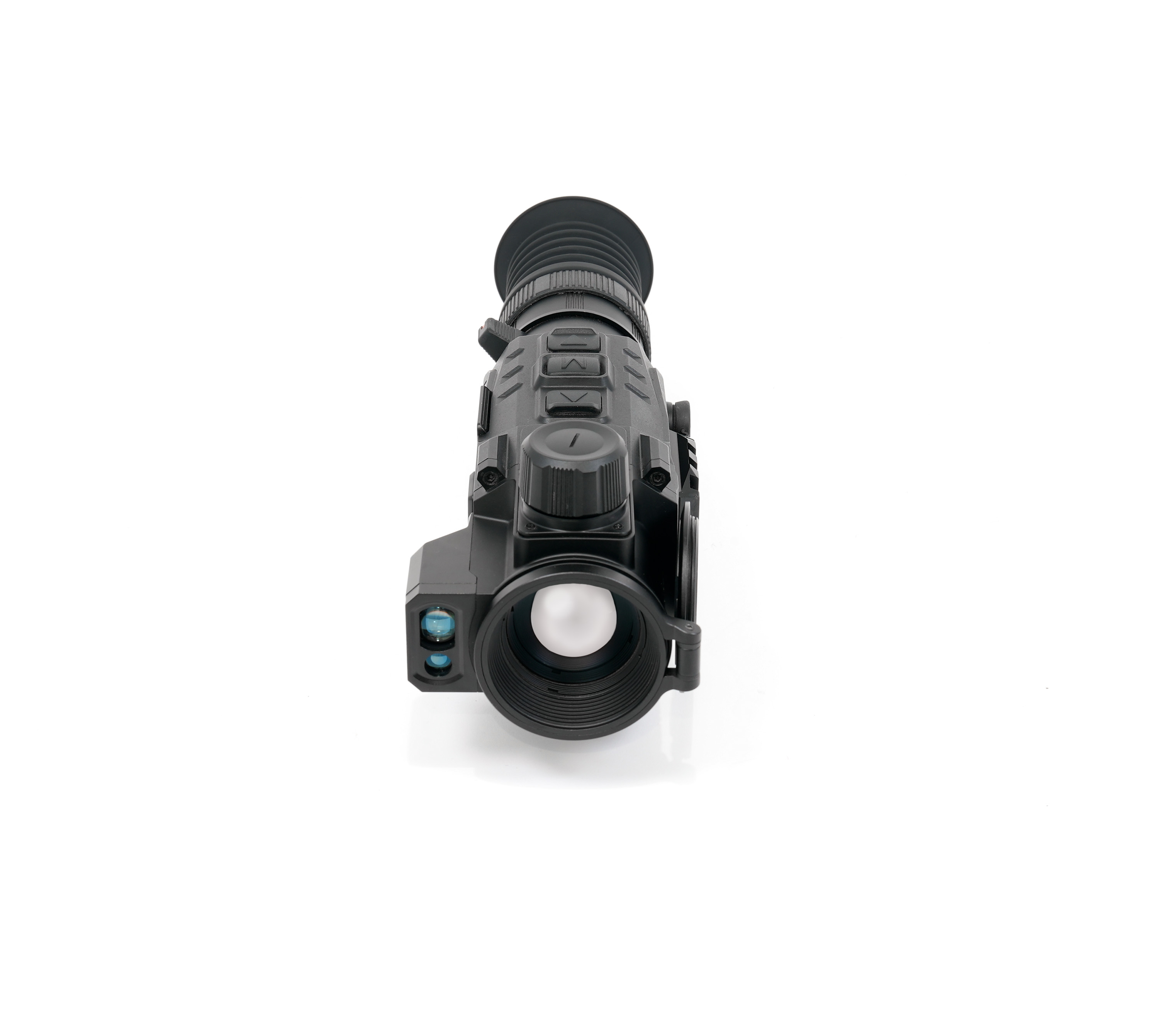 Close-up of a dark gray rifle scope, viewed from the bottom with knurled adjustment rings and lens at center