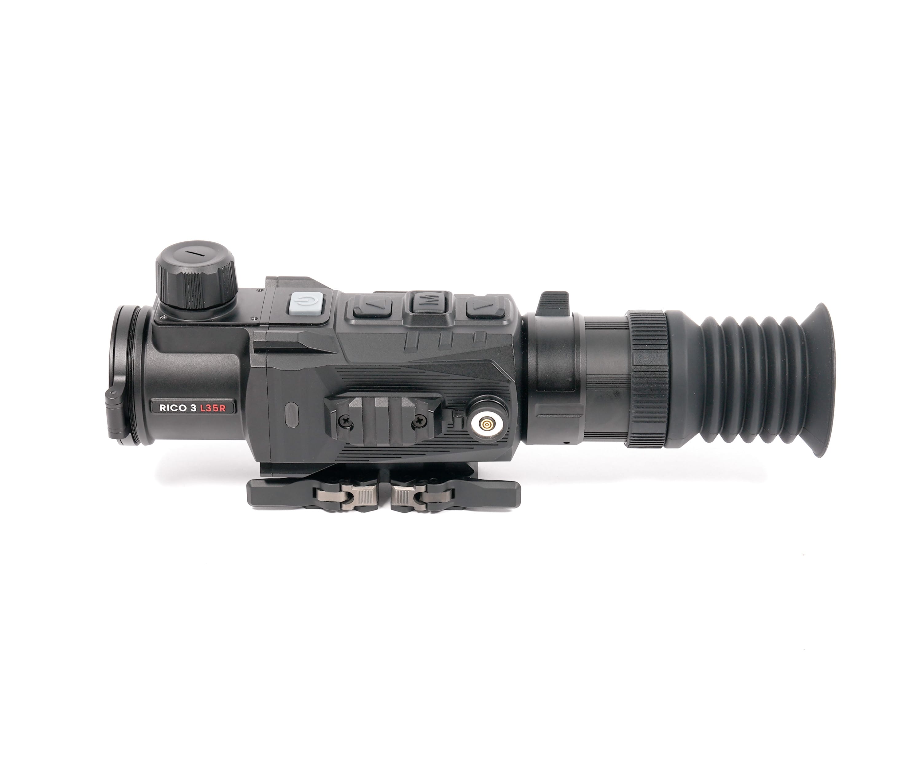Close-up of a black video camera from the side, showing the lens barrel and control buttons.