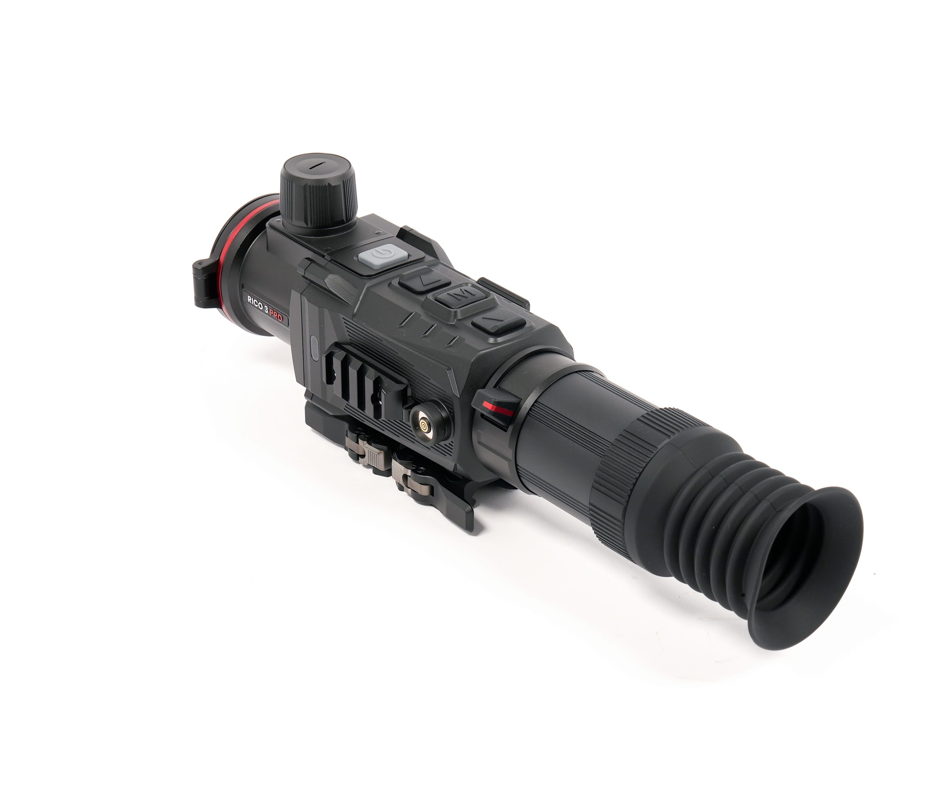 Close-up of a black optical scope with a large textured adjustment knob and long ridged tube. Marked 'RICO 3 PRO' on the side.