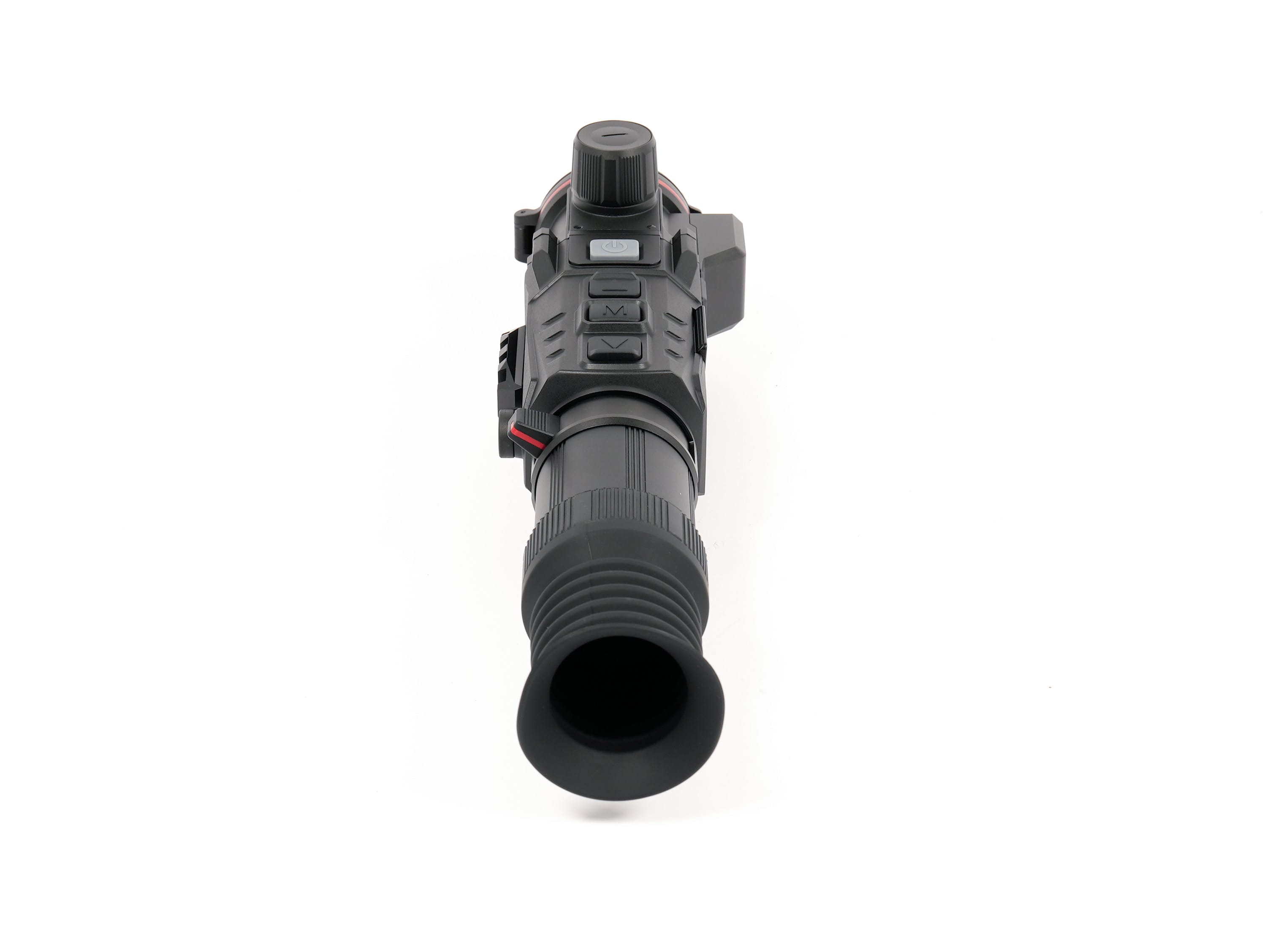 Close-up of a black rifle scope with textured grip, adjustment buttons, and a large eyepiece viewed from above.