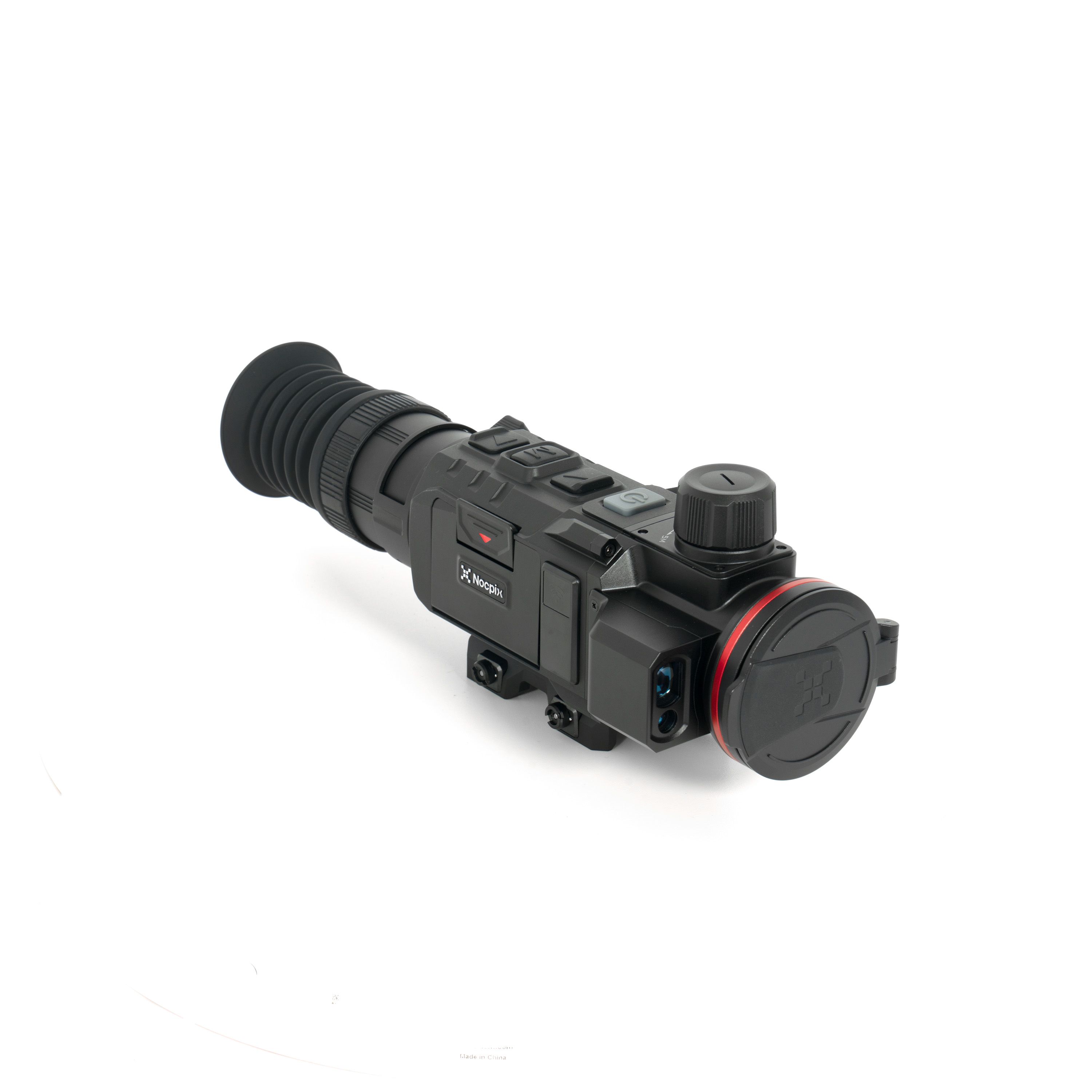 Close-up of a dark gray optical scope with large eyepiece, adjustment knobs, and a red ring on the side; small brand text visible on the body.