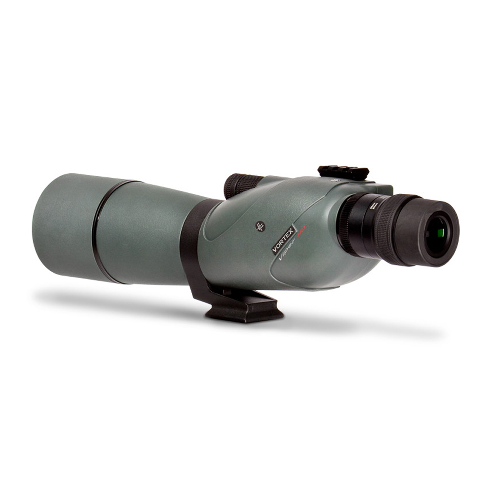 Green spotting scope with an eyepiece and compact base for distant viewing, often used in birding or wildlife observation, shown on a small mount.