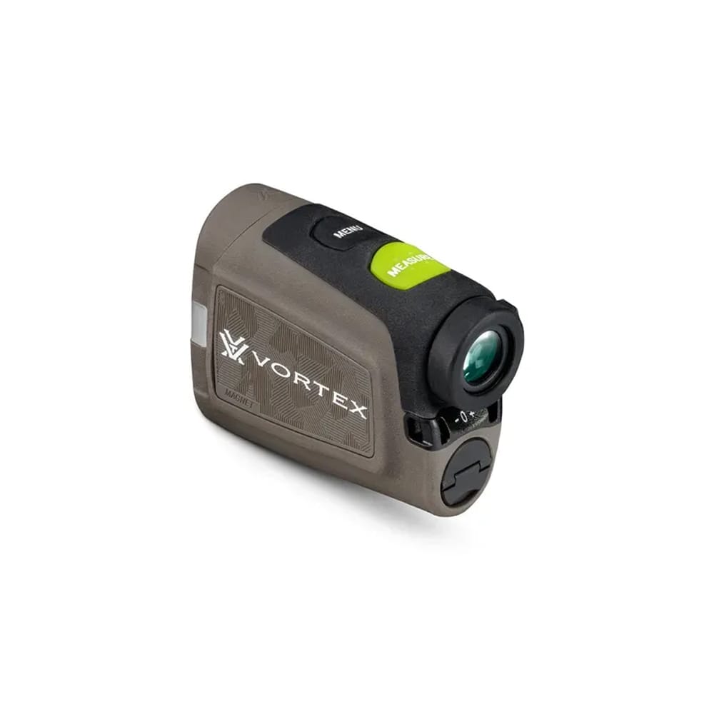 Compact Vortex red dot sight for a firearm, featuring a green activation/measure button on top and a protective lens.