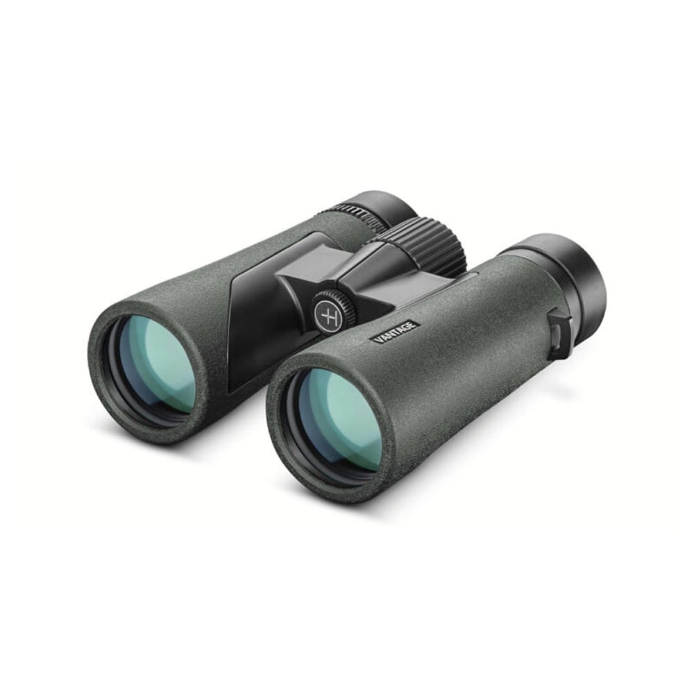 Dark green binoculars with a central hinge and textured exterior, viewed from above.