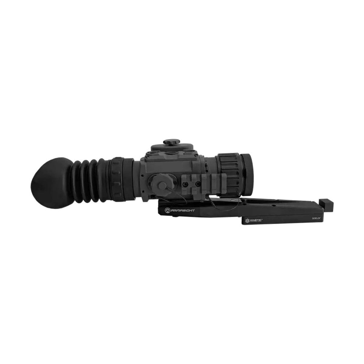 Armasight rifle optic with magnifier mounted on a Picatinny rail, featuring a rubber eyecup and adjustment knobs.
