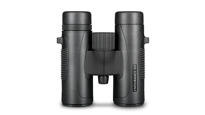 Black binoculars with a central hinge and textured grips, labeled ENDURANCE ED, facing forward on a white background.