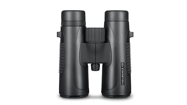 Compact black binoculars with central hinge, facing forward; labeled Endurance ED on right tube.