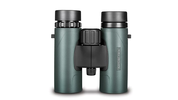 Green binoculars with black eyepieces and a central hinge, branded Nature Trek.