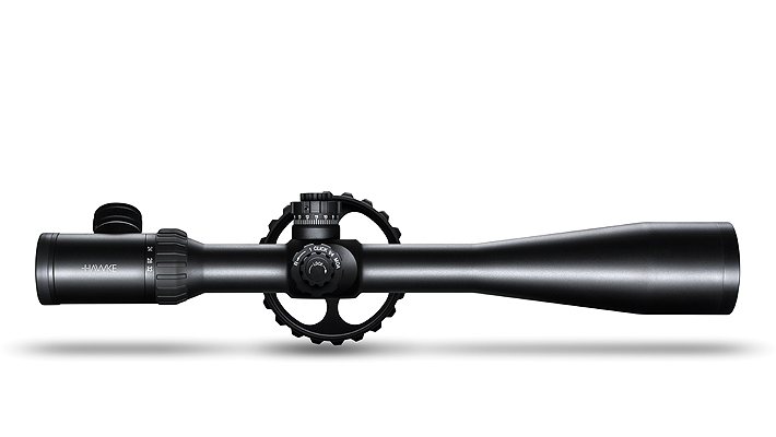 Black rifle scope with adjustment turrets and focus knob, shown from the side on a white background for aiming precision.