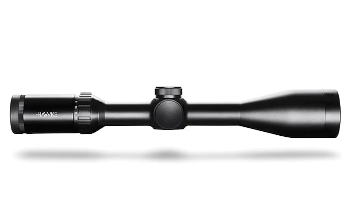Black rifle scope with adjustment knobs and Hawke branding, shown in profile with a shadow beneath.