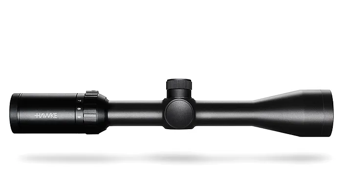 Black Hawk-style rifle scope with adjustable turrets, Hawke logo on the eyepiece, shown in profile with a soft shadow beneath.