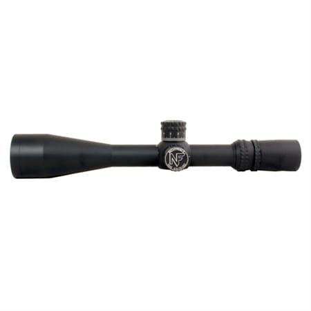 Black riflescope with adjustable turrets and eyepiece, Nightforce branding visible, aimed for precision aiming on a rifle.